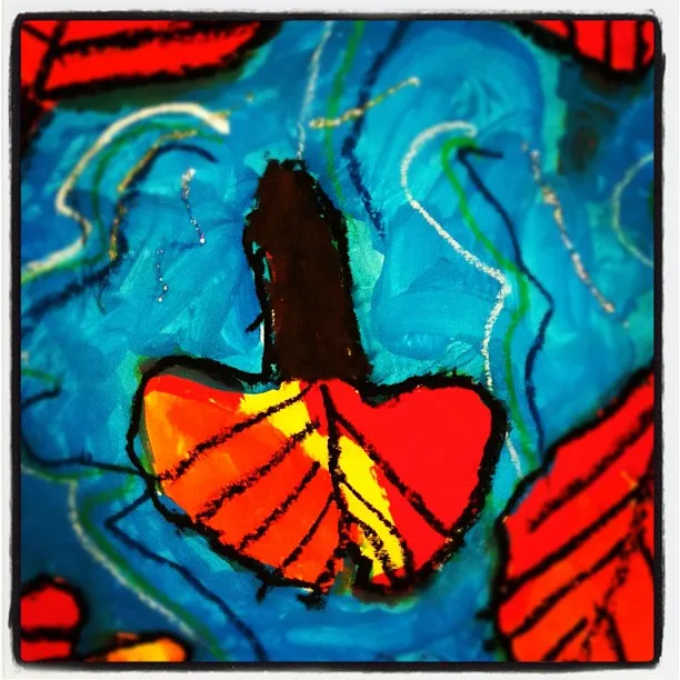 Colorful drawing of a butterfly with bright red and yellow wings outlined in black, set against a textured blue background with swirling lines.