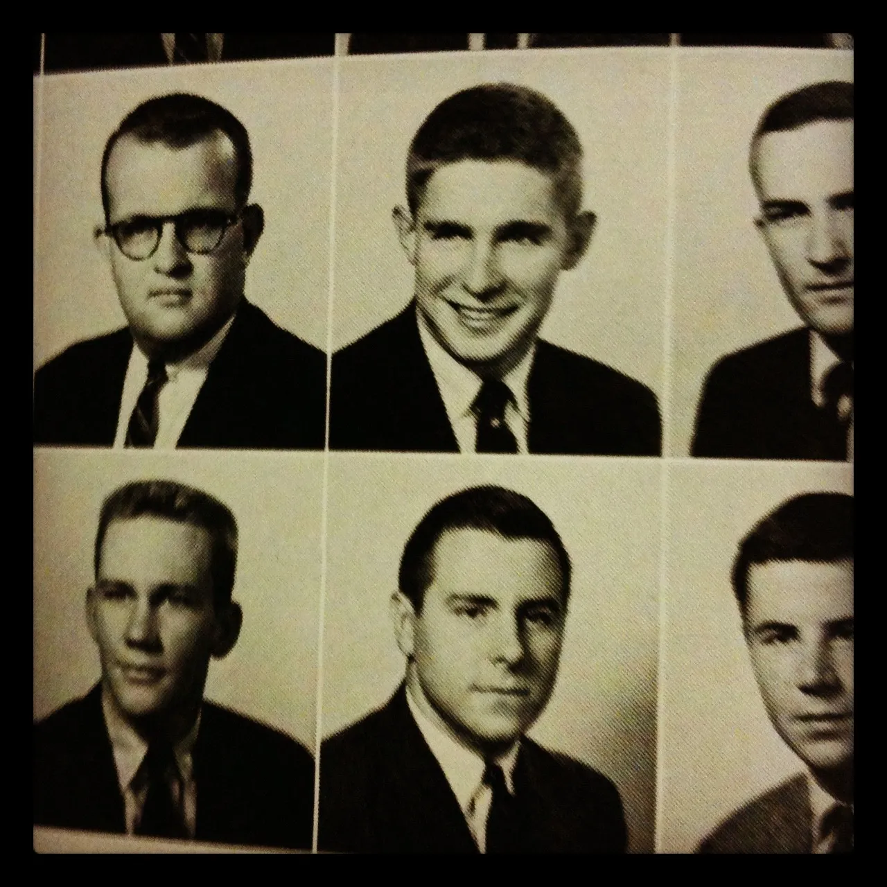 Vintage black and white yearbook page showing six portrait photos of young men in suits, arranged in a 3-by-2 grid format.