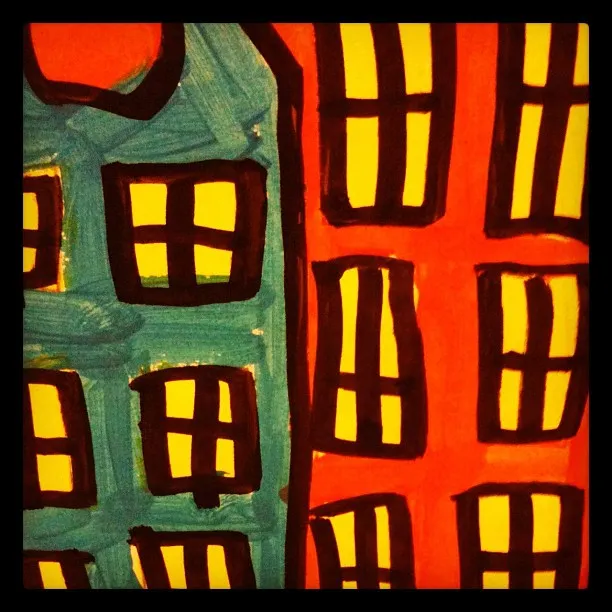 A bold, childlike painting of two buildings, one blue and one red, with yellow-paned windows outlined in thick black lines.