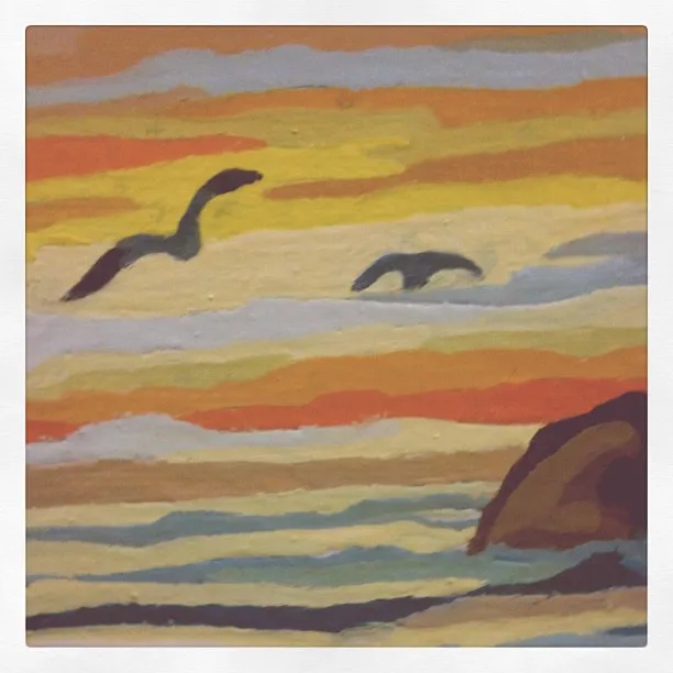 A stylized painting of a seascape at sunset with layered clouds, two flying birds, and a rocky shoreline in the lower right.