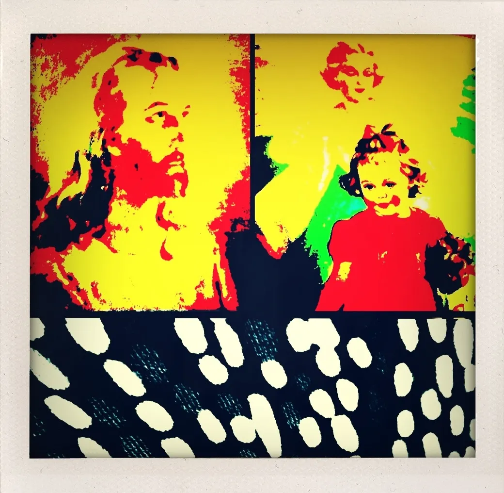 Collage with stylized portraits of a bearded figure, a woman and child, and a pattern of large white ovals on a black background.