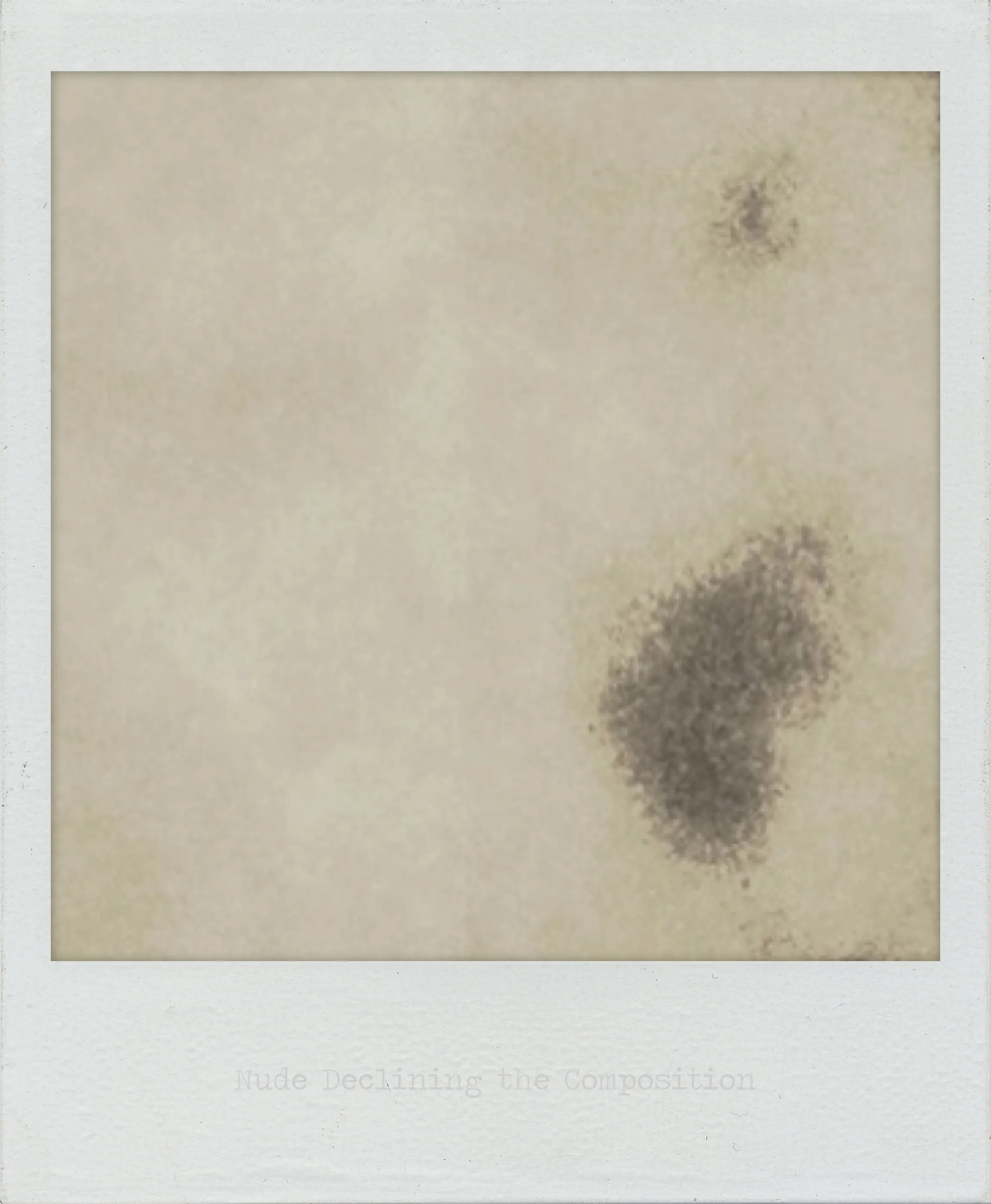 Faded image with soft beige tones and two irregular dark patches on the right side.