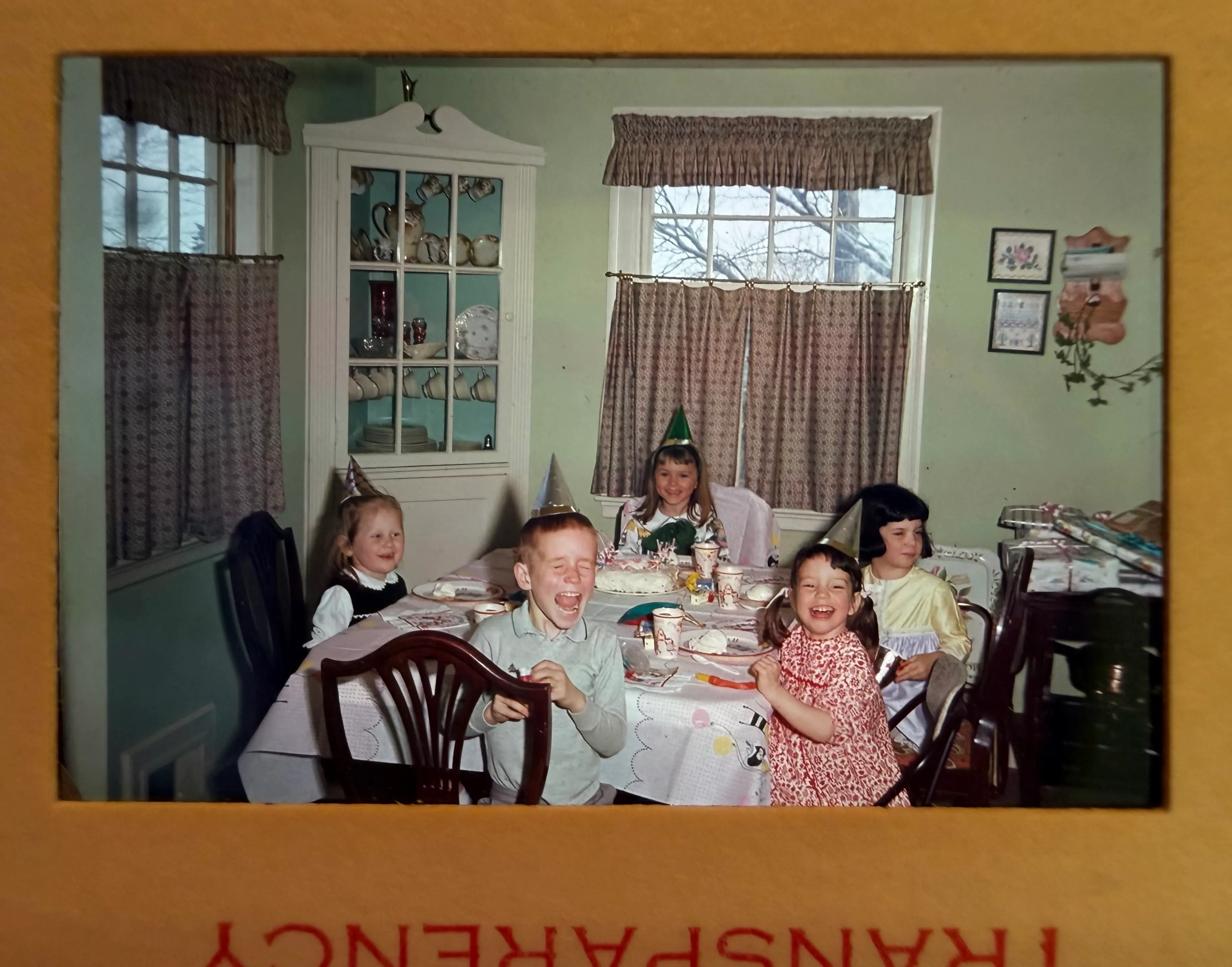 Vintage color photograph of children's birthday party in cardboard transparency slide